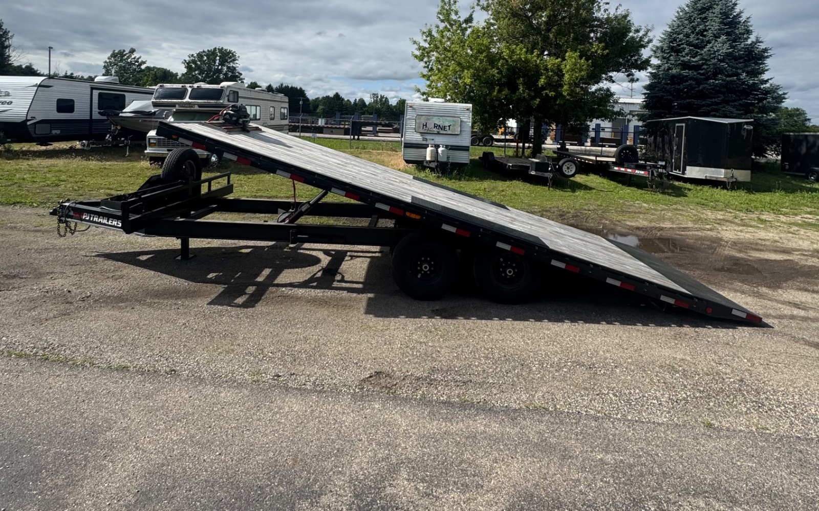 Deck over tilt trailer rental at Haul Yeah Trailer Rentals in Allendale, MI