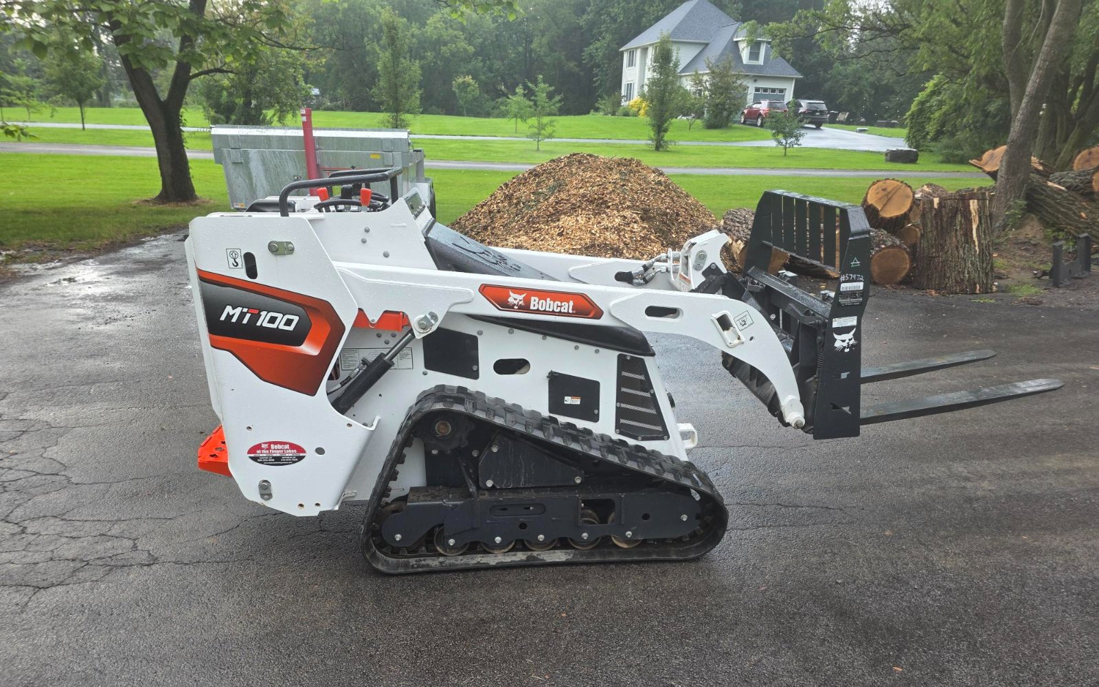 Pallet forks attachment for the Bobcat MT100, rental in Webster, NY
