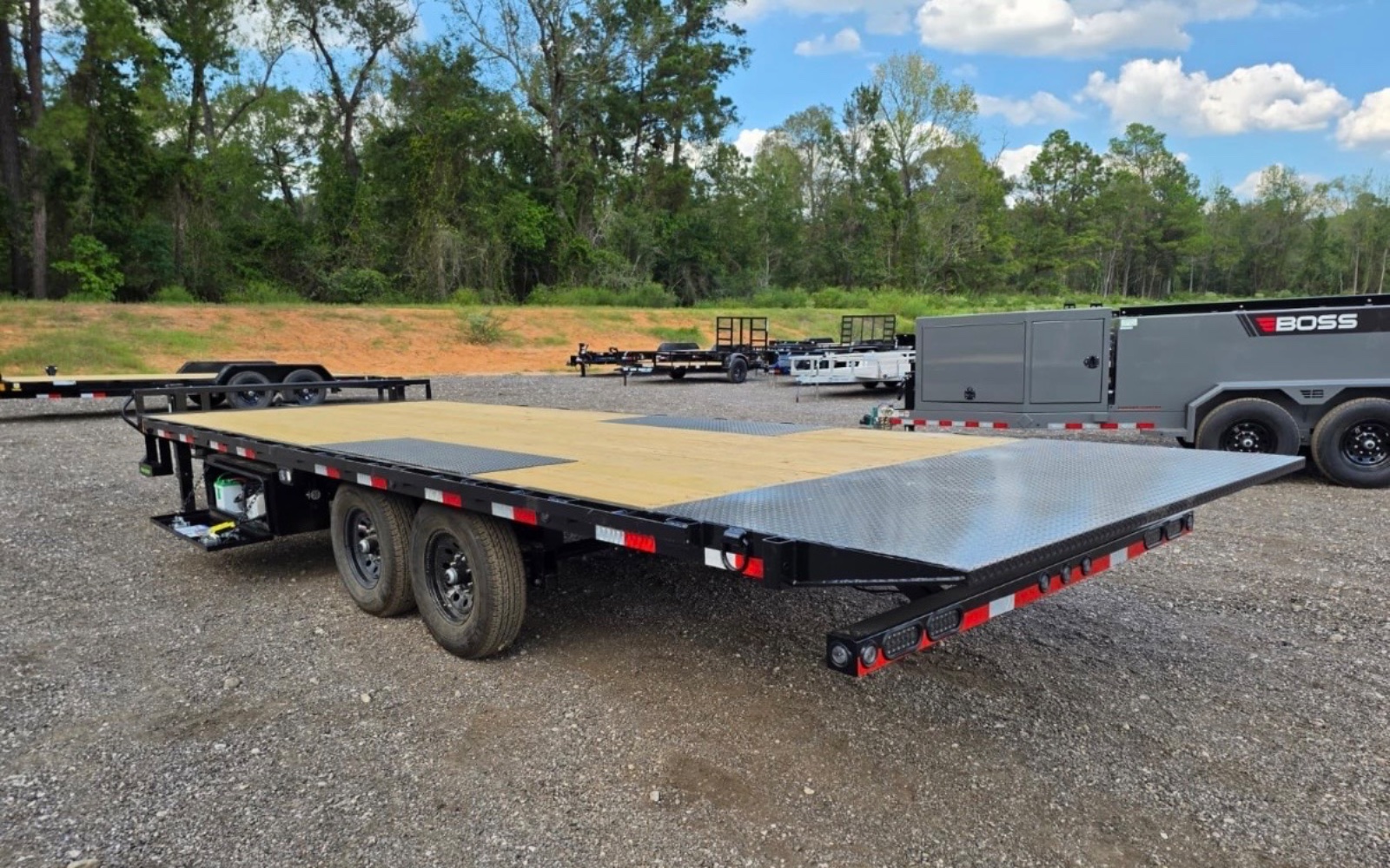 24 foot by 102 inch deck over tilt trailer rental with winch in Beach City, TX